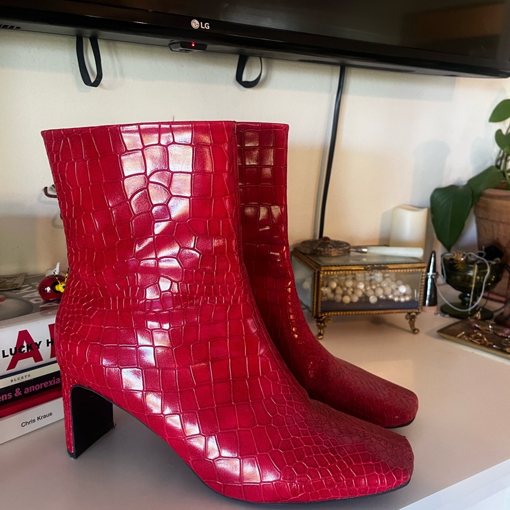 Red faux snakeskin leather bootie heels